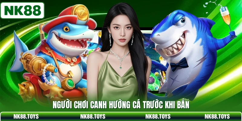 Người chơi canh hướng cá trước khi bắn